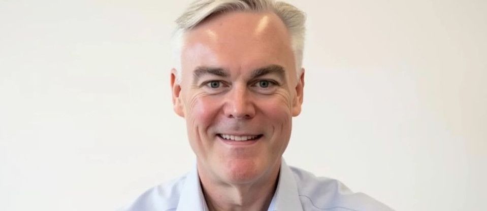 Portretfoto van Tom Christenson, SVP B2B bij Zalando.
