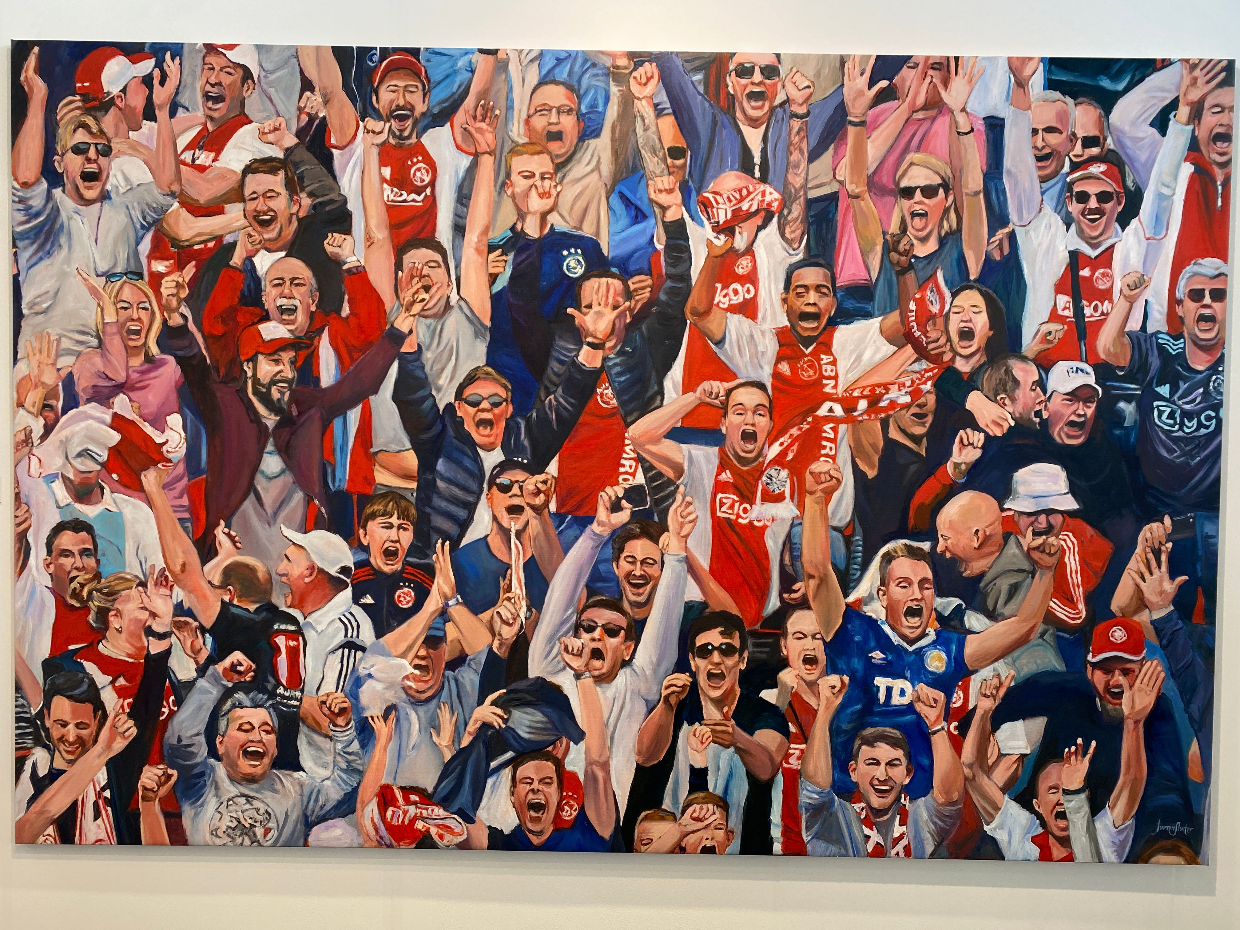 Het werk met juichende Ajax-supporters 
