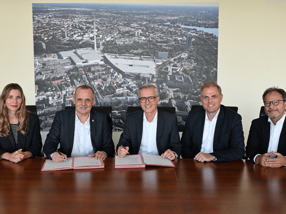Ondertekening overeenkomst Intergeo door DVW en Hamburg Messe und Congress