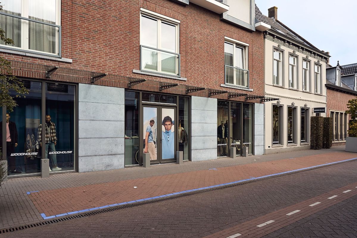 OFM neemt mannenmodewinkel Woodhouse over
