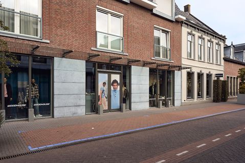 OFM neemt mannenmodewinkel Woodhouse over