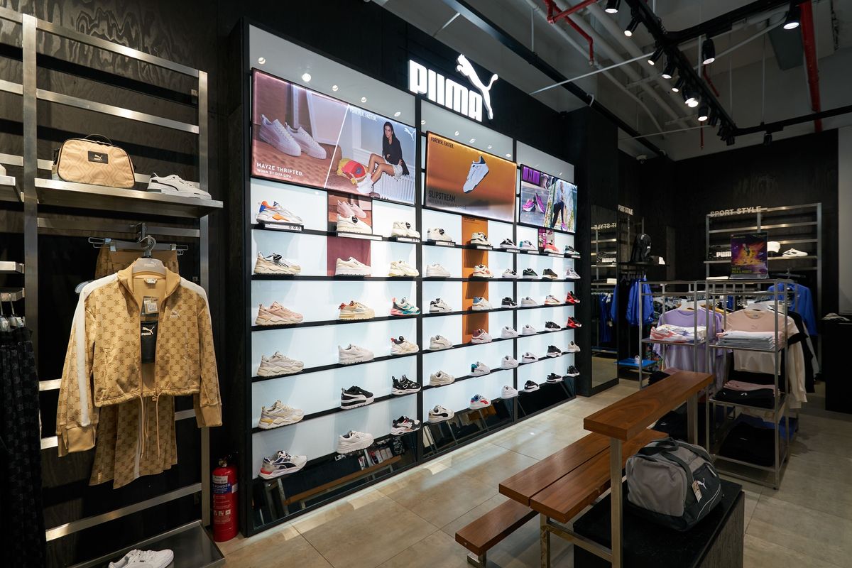 Asics ontkent interesse in overname Puma